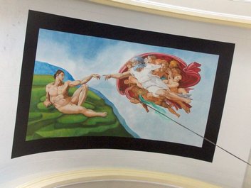 On peint les voûtes. Le peintre s'inspire largement de Michel-Ange On peint les voûtes. Le peintre s'inspire largement de Michel-Ange